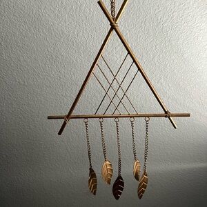 Gold Geometric Wall Hanging with Leaf Accents